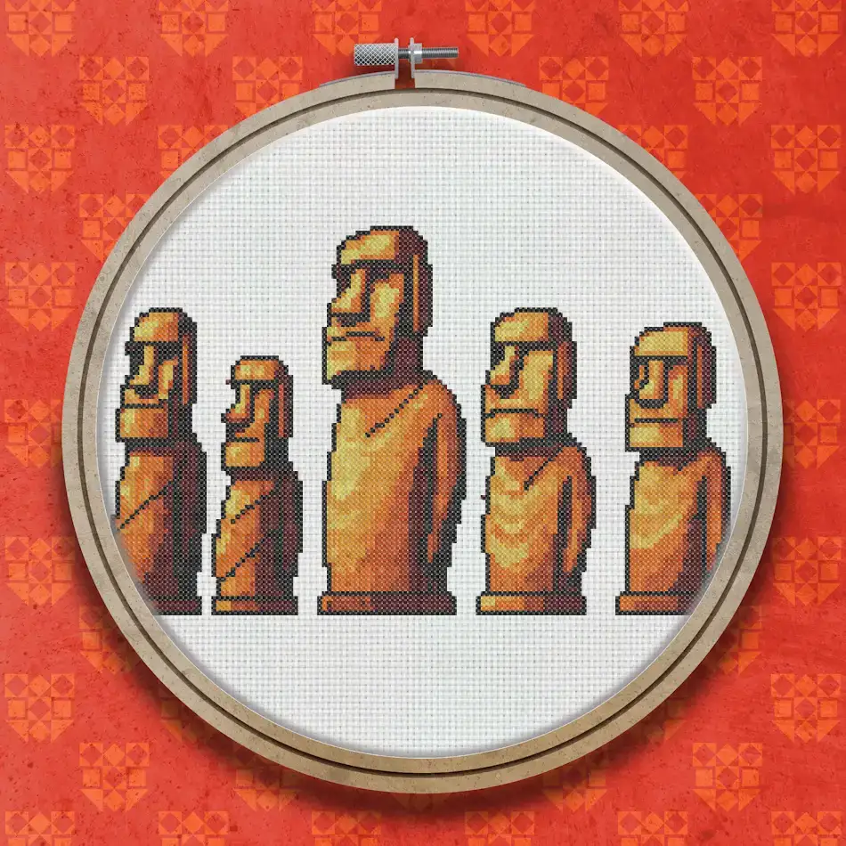 Cross stitch design showing five brown stone Moai statues standing in a row against a light background, rendered in earthy tones.