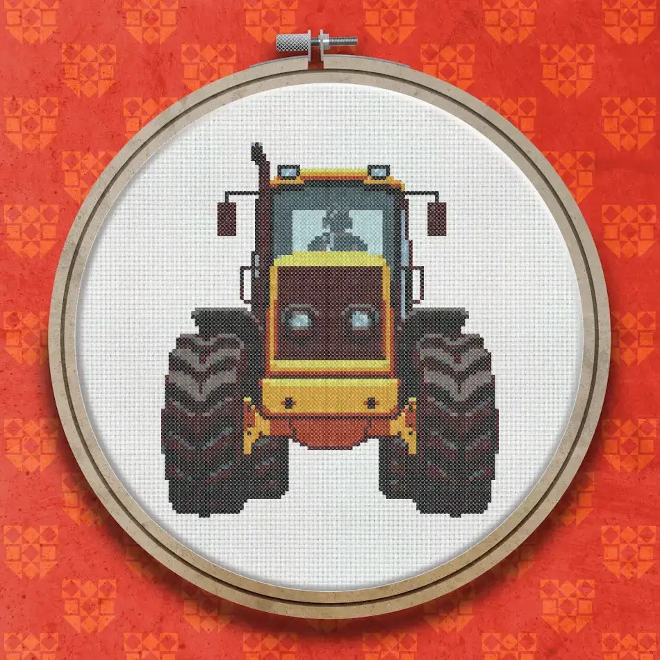 Cross stitch design of a yellow tractor seen from the front, with large black wheels, an orange cab, and a driver visible through the windscreen.