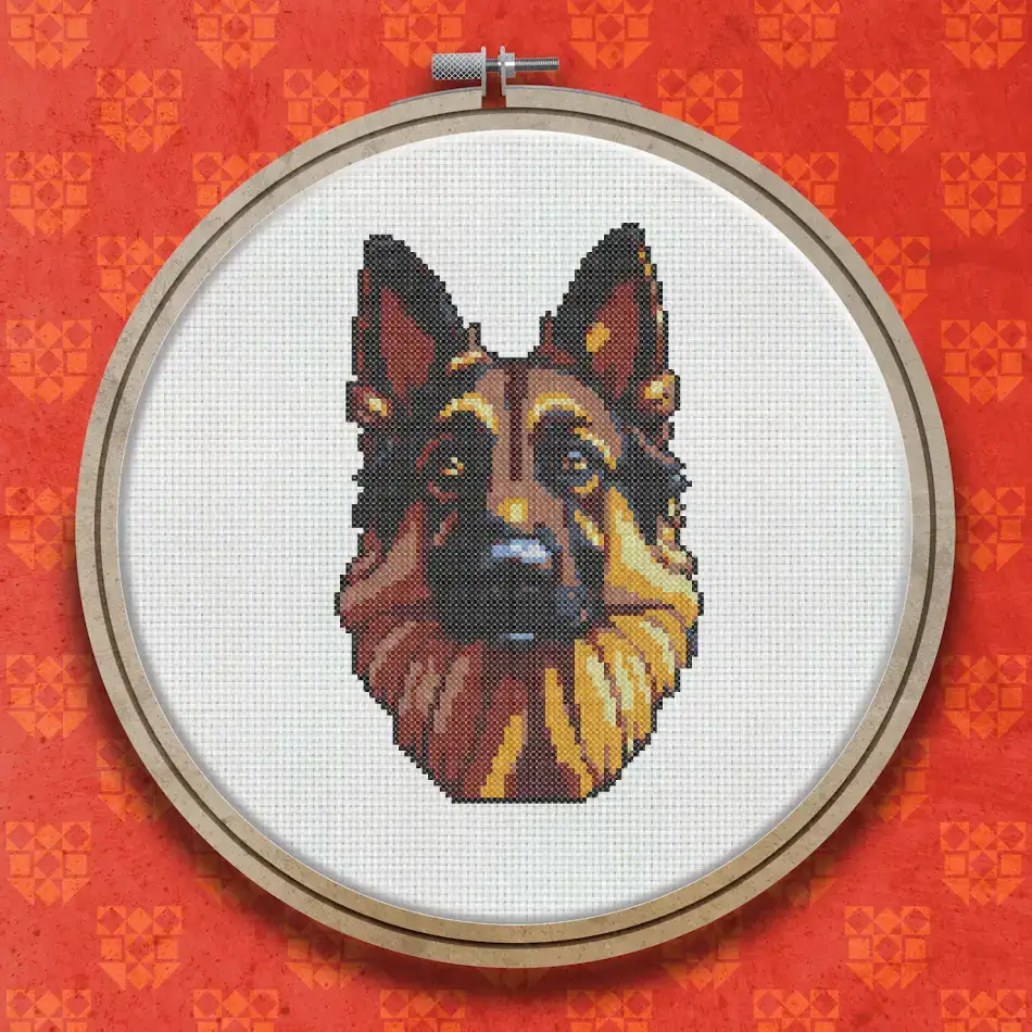 Cross stitch portrait of a German Shepherd with golden, tan and dark brown fur, facing forward with an alert expression, on a white background.