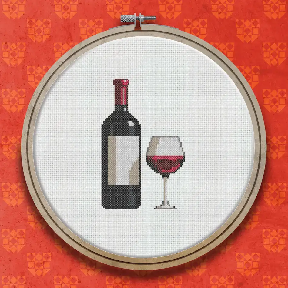 Cross stitch design showing a dark red wine bottle with a label next to a stemmed glass filled with red wine
