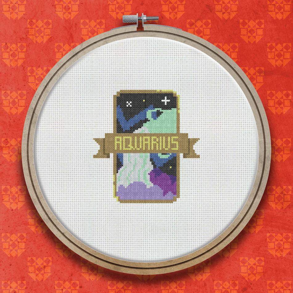 Cross stitch pattern showing the Aquarius zodiac sign as a badge with stars on a dark navy background with a decorative border.