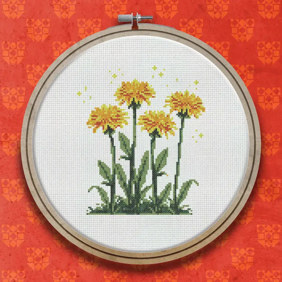 Cross stitch design of five tall golden yellow dandelion flowers with green stems and leaves, with small sparkle details on a white background.