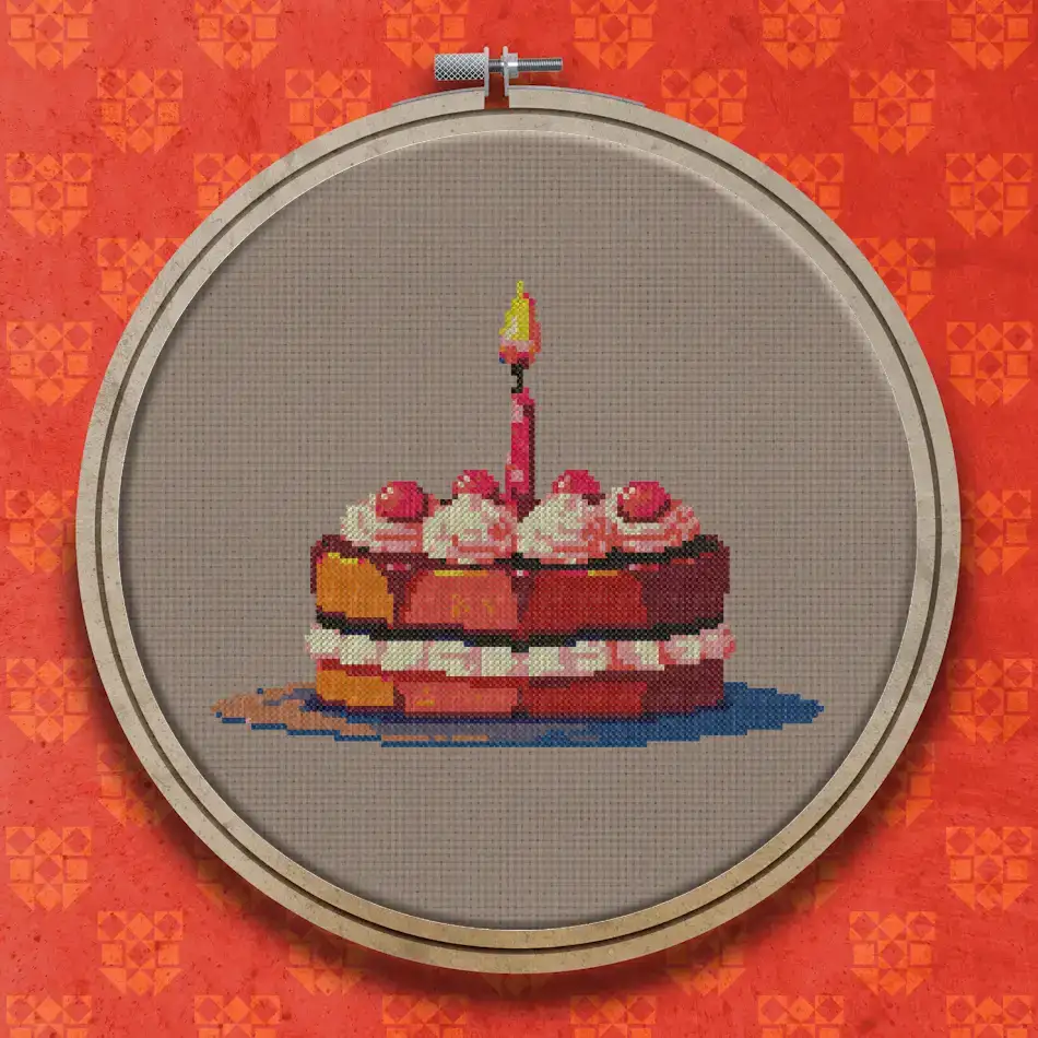 Layered cake with pink cream swirls, red berries on top and a single lit orange candle, on a small dark blue plate