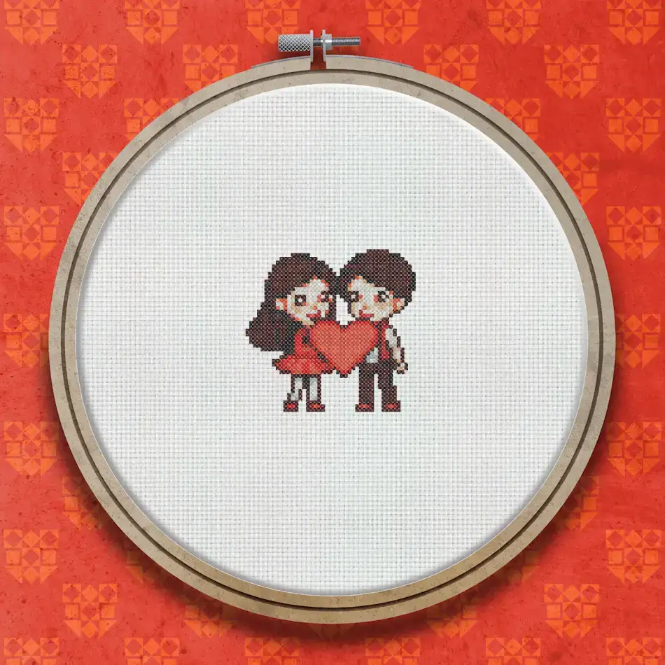 Cross stitch design of a couple in matching red outfits standing side by side, depicted in a simple charming style on a white background.