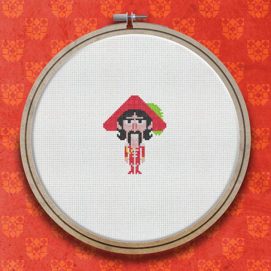 Cross stitch portrait of a figure with dark hair in a red and black outfit with decorative details on a white background