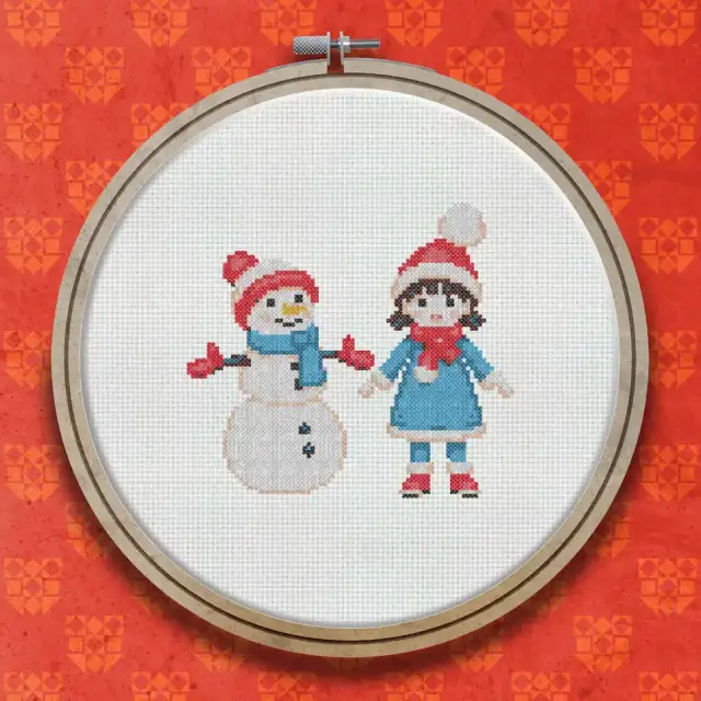 A Snowman And A Girl cross stitch pattern