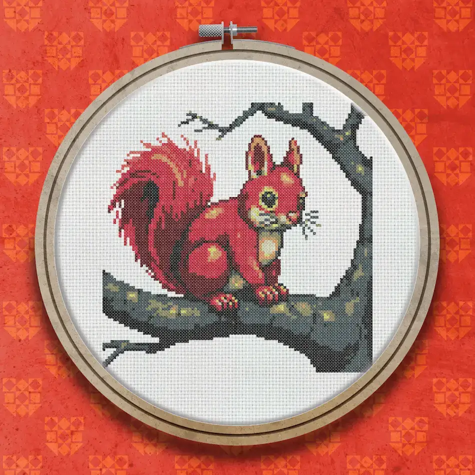 Cross stitch pattern of a red squirrel sitting on a dark tree branch, shown in warm russet and brown tones against a white background.