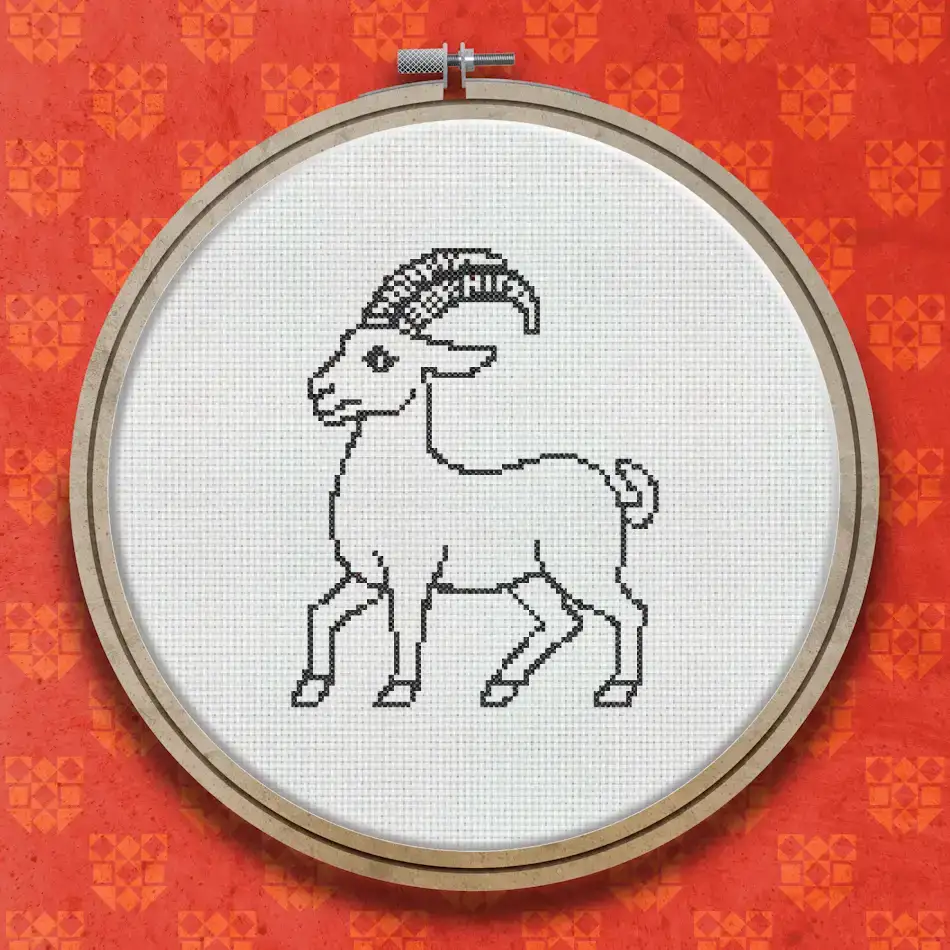 Cross stitch pattern of a goat in profile, depicted in black in a bold woodcut style with horns, beard and raised front hoof, on a white background.