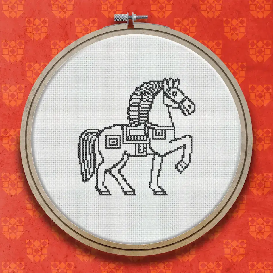 Cross stitch pattern of a decorated horse in profile facing right, shown in black on white in a bold woodcut illustration style.