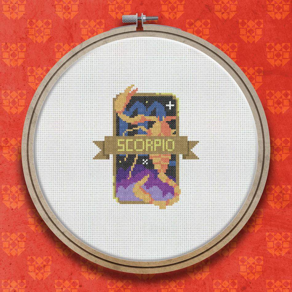 Cross stitch pattern showing an orange and gold scorpion figure on a dark navy background with small star details and a gold Scorpio label