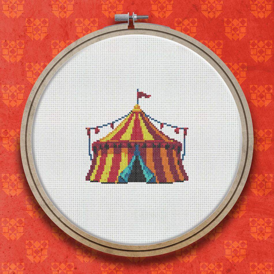 Cross stitch design of a red and yellow striped circus tent with a blue pennant flag on top, shown against a plain background.