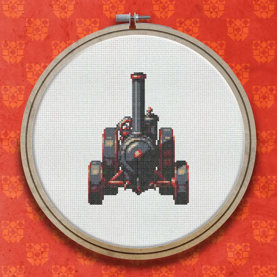Cross stitch design of a red and black traction engine with large rear wheels, a chimney stack, and a compact boiler body, viewed from the front.