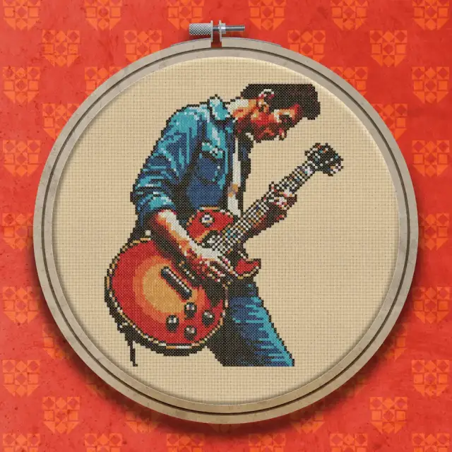 Rock Guitarist in Blue Denim cross stitch pattern