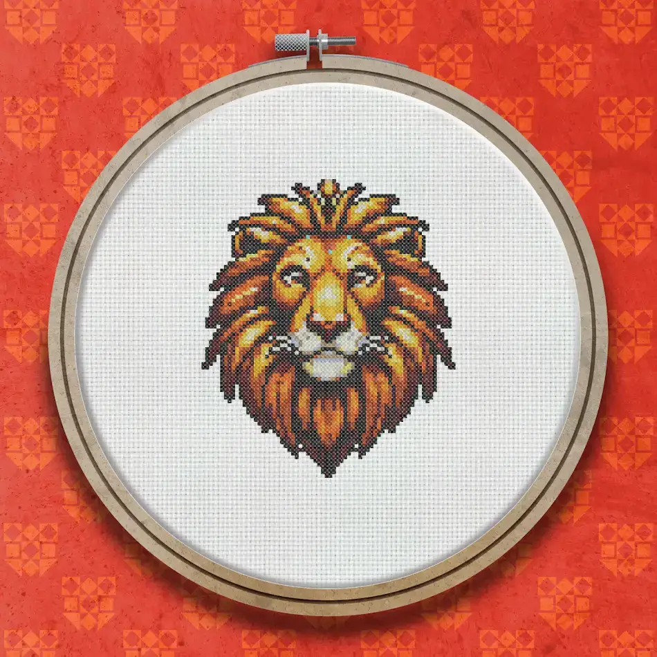 Cross stitch pattern of a lion's face and mane in shades of gold, amber, orange, and dark brown on a black background.